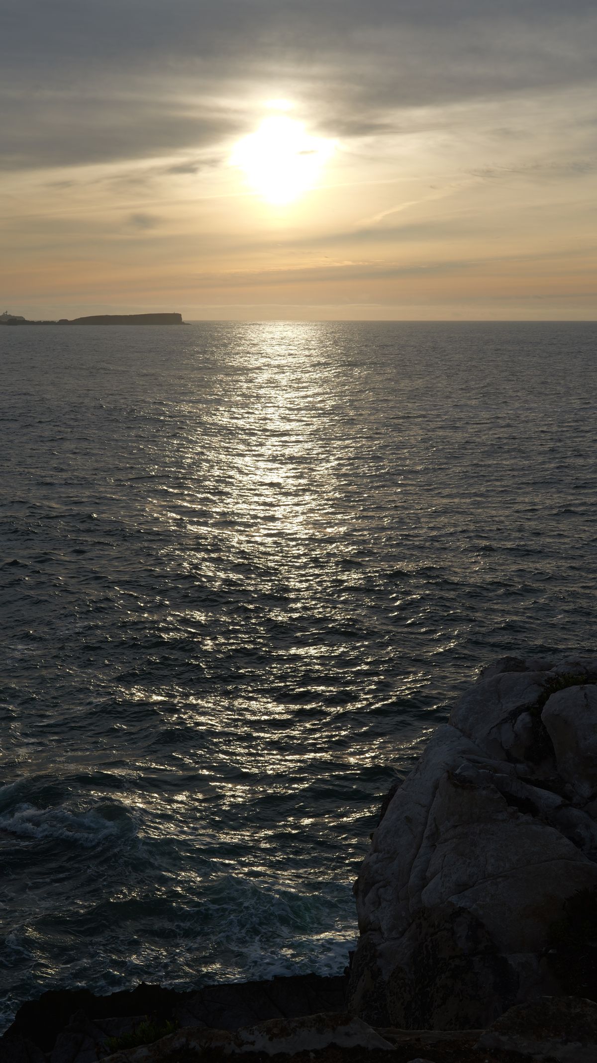Sun as a crisp star over the horizon